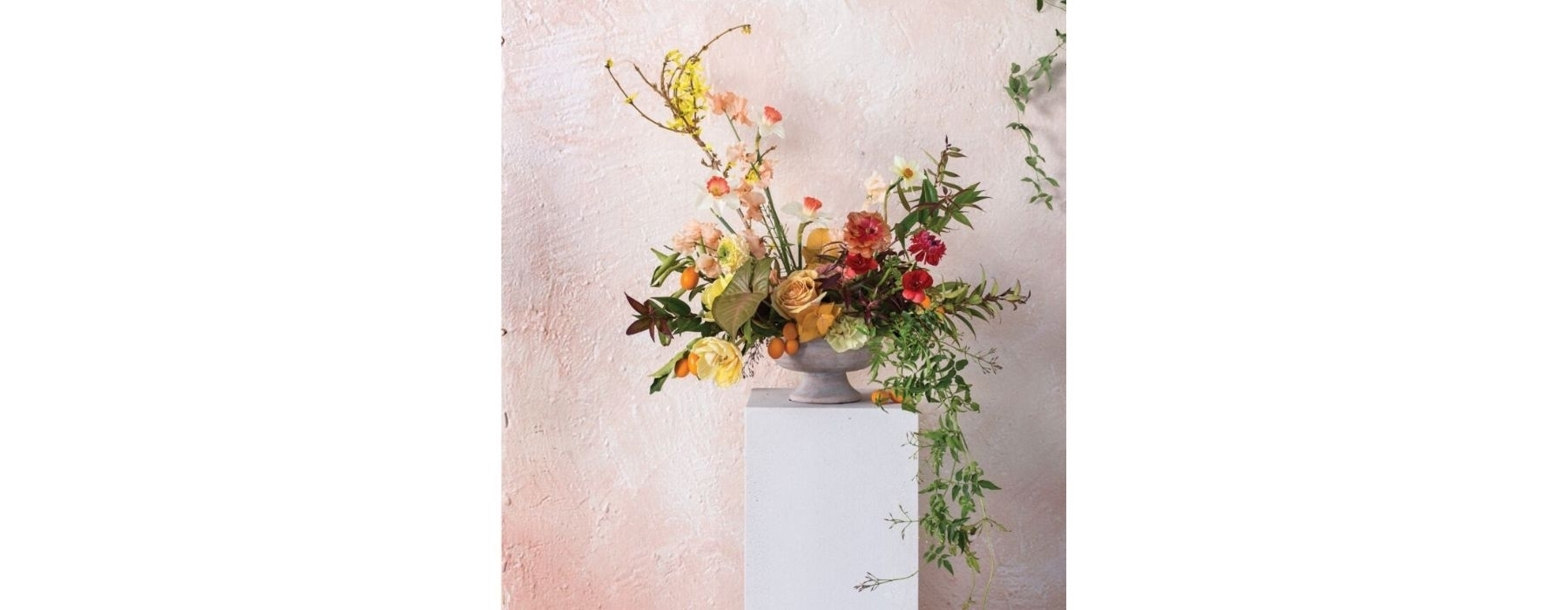 Multiple dahlias arranged in a vase. 